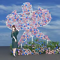 Colorful Balloon Star Shaped Photo Check-in Spot With Flowers And Blue Sky