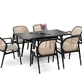 Modern Dining Table Set With Wicker Back Chairs And Black Sleek Tabletop Design 3d model