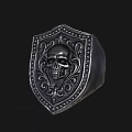 Silver Shield Shaped Ring with Intricate Skull Pattern and Ornate Decorative Details 3d model