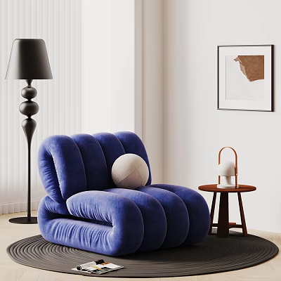 Blue Plush Single Sofa With Curved Design Black Floor Lamp Side Table And Wall Art 3d model