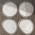 Stylish Round Rugs With Fringed Edges And Diverse Woven Patterns On Wooden Floor