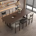 Modern Wooden Dining Table Set With Mixed Color Chairs And Flower Vase On Wooden Floor Interior