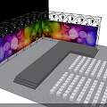 Colorful Stage Design With Rainbow Lights Circle Patterns Light Beams And Audience Seats