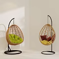 Stylish Rattan Egg Hanging Chairs With Green Red Yellow Cushions And Black Metal Stand
