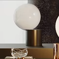 Modern Table Lamp With Copper Gold Base White Globe Shade And Decorative Accents