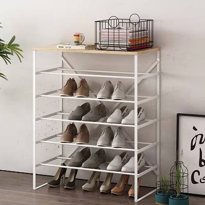 White Multi Tier Shoe Rack With Various Shoes And Top Decor Items 3d model