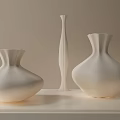 Three White Textured Vases Displayed On Light Colored Countertop With Beige Background 3d model