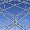 White Geometric Grid Structure As Architectural Roof Component With Sky Background