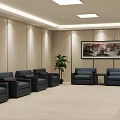 Hotel Public Lounge Area With Dark Sofas Side Tables Green Plants And Decorative Painting