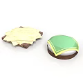 Yellow Pastry Slices On Brown Tray And Round Box With Green Lid And Yellow Trim