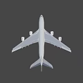 White Commercial Passenger Airplane with Four Engines Wings Tail and Landing Gear in Flight