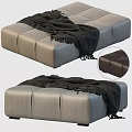 Modern Light Gray Leather Ottoman With Fringed Black Blanket And Stitched Details