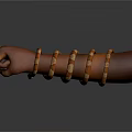 Human Hand Fist Wearing Multiple Golden And Brown Bracelets On Dark Background