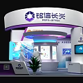 Modern Exhibition Booth With Brand Logos Large Screens Display Area And Green Plants