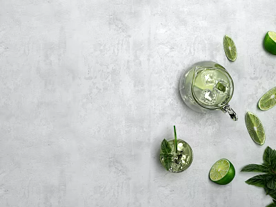 Refreshing Fresh Lime Mint Drink in Glass Pitcher with Cup and Ingredients on Gray Background 3d model