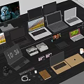 Various Laptop Models Desktop Monitors And Electronic Accessories On Office Desk