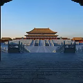 Ancient Chinese Architecture View Through Red Gate With Bronze Nails And Yellow Roof