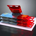 Red and Silver Foil Packaging Equipment Pouches with Resealable Tops Stacked on White Surface
