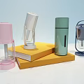 Stylish Daily Electrical Appliances With Modern Design In Pink Silver Green Blue On Yellow Platform