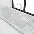 Black Double Bowl Kitchen Sink With Faucet Drainer On White Marble Countertop