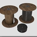 Two Wooden Cable Spools With Black Wire And Circular Cap Design