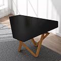 Modern Coffee Table With Black Top And Wooden Cross Legs On Gray Living Room Rug