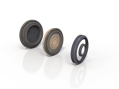 Three Circular Industrial Equipment Parts Featuring Different Rubber And Metal Components 3d model