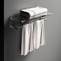 Modern Bathroom Shelf With Folded Towels On Top And Hanging Towels Below