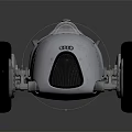 Audi Vintage Race Car With Silver Streamlined Body And Brown Leather Seat