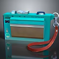 Vintage Green Portable Computer With Screen Control Buttons And Red Leather Strap