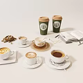 Various Coffee Cups with Latte Art Green Takeaway Cups Open Book Nuts and Milk Jug