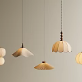 Minimalist Design Pendant Lights With Wooden Elements And Different Shaped Shades Hanging In Neutral Tone