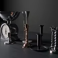 Various Designed Metal Candle Holders in Silver Black Copper Colors on Dark Tabletop Background