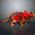 Colorful Triceratops Dinosaur Toy With Vibrant Red Orange And Blue Details