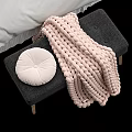 Cozy Double Bed With Plush Pillows Knitted Blanket And Nightstand Decor