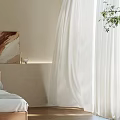 Cozy Bedroom Interior With Beige Wall White Sheer Curtains Artwork And Green Plant