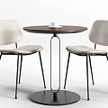 Modern Round Wooden Table With Light Cushioned Chairs And Black Metal Legs