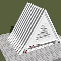 White Triangle Shaped Building With Hollowed Out Design And Red Signage Surrounded By Trees