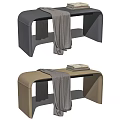 Black and Beige Leather Ottomans with Gray Blanket and Stack of Books