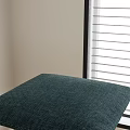 Padded Bar Stools In Dark Green And Brown With Wooden Legs Indoor Near Green Plants