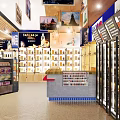 Tobacco and Liquor Store Interior With Display Shelves Refrigerators and Cigarette Counter