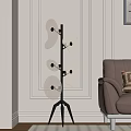 Modern Floor Lamp With Irregular Panels And Metal Stand Next To Leather Sofa