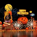 Halloween Photo Spot With Happy Halloween Sign Carved Pumpkin And Wheel Decorations