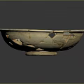 Broken Bowl Sculpture With Cracked Design And Beige Blue Brown Decorative Patterns