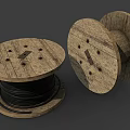 Vintage Wooden Cable Reels With Black Cables And Wooden Spools Placed Flat And Sideways