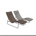 Upholstered Modern Lounge Chairs in Brown and Beige with Black Metal Frames and Curved Design