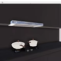 Modern Kitchen With Hisense Range Hood Black Countertop And White Cooking Pots On Stove