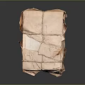 Packaged Household Items Wrapped In Brown Paper Tied With String For Home Storage Or Moving