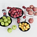 Assorted Fresh Fruits in Glass and Black Bowls with Plums Apples and Apricots