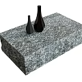 Modern Gray Marble Textured Coffee Table With Two Black Vases On Top